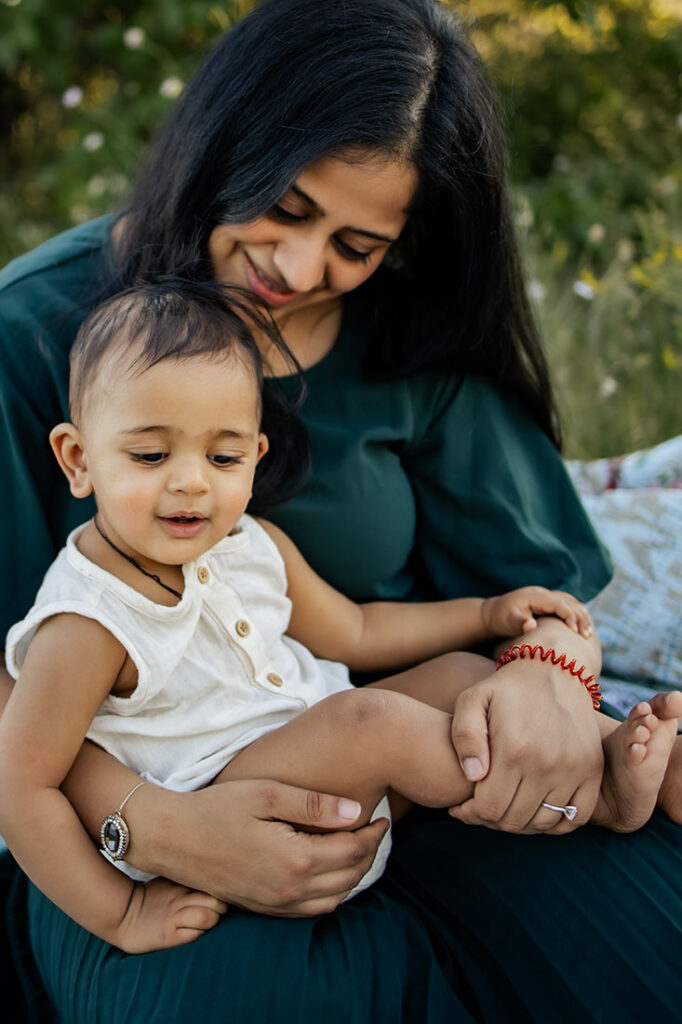 Baby with mom at a photo session in Arbor Hills with Anna Roorda Photography.