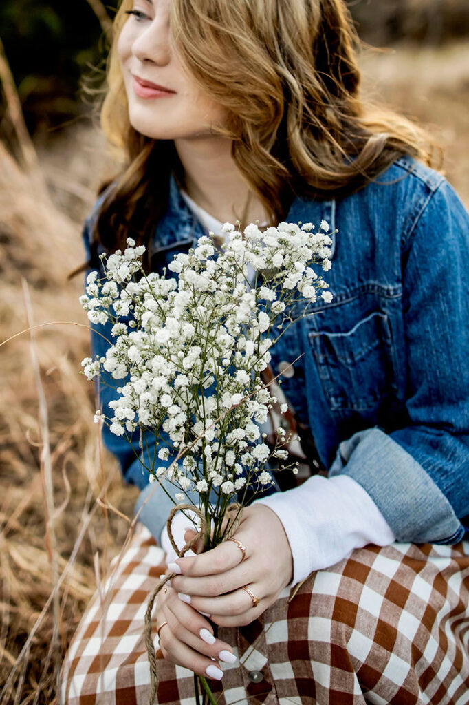 Coram Deo Senior girl smiles for her pictures in flower mound, TX.