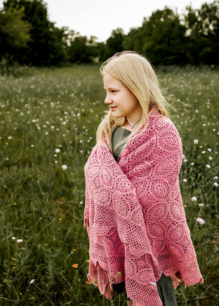 Young girl from Carrollton, TX walks in a field of wild flowers in Plano, TX at Arbor Hills Nature Preserve.