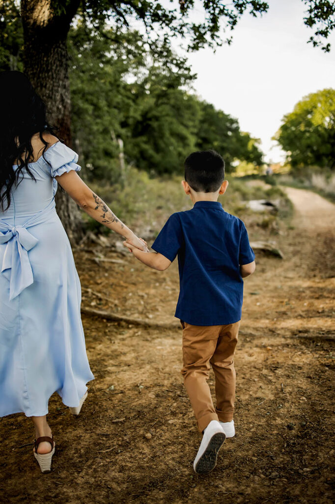 A mother and son from Southlake, TX walk a path at Grapevine Lake.