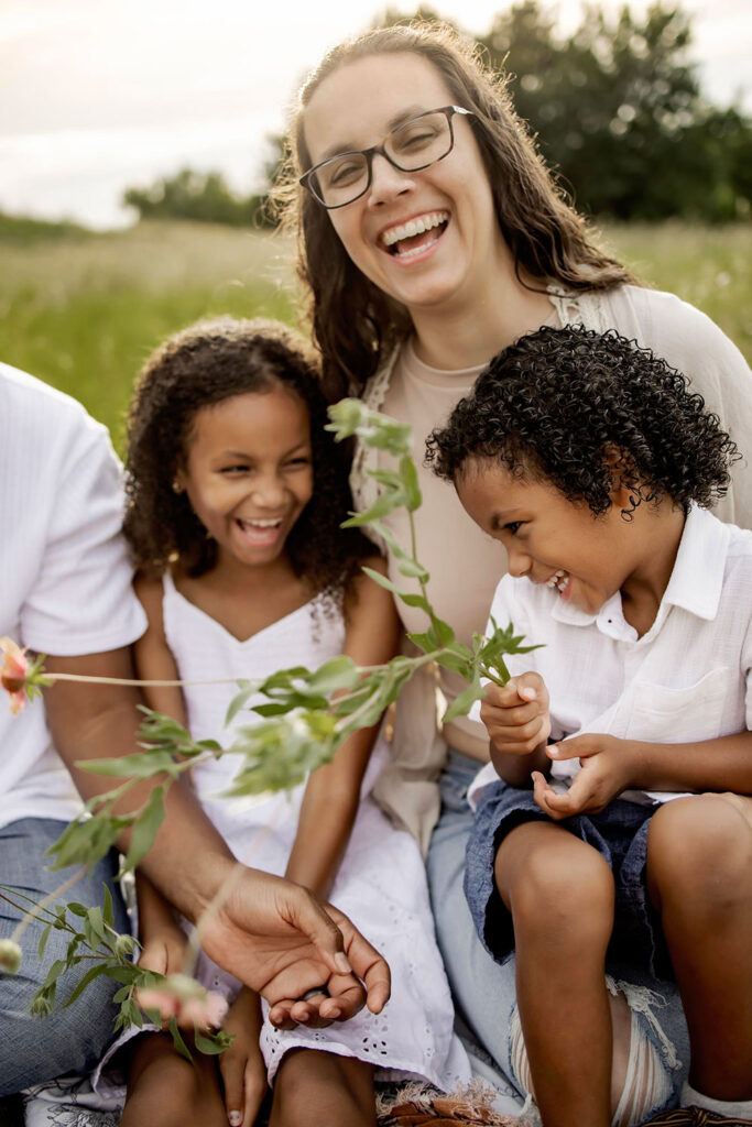 kids laughing at a family photo session in Plano Texas