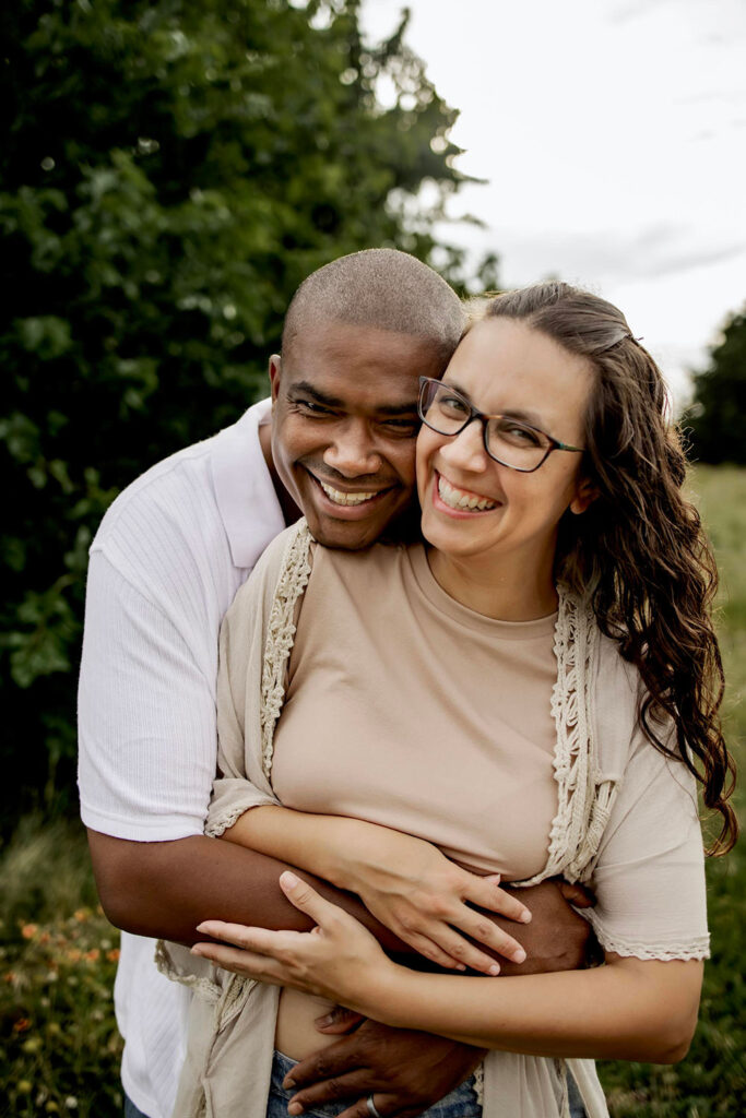 husband and wife couple at a family session in Plano texas